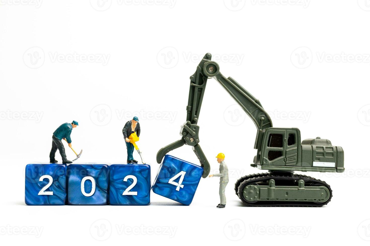 Miniature people , Worker team flips a block with the number 2024 photo