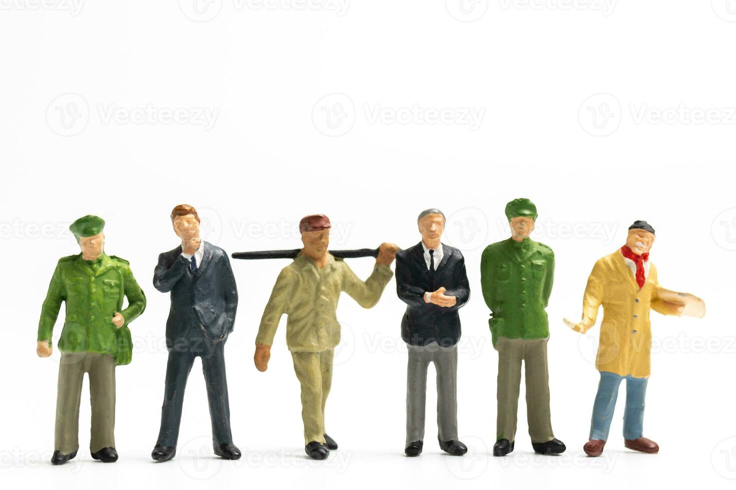 Miniature people different professions standing on white background , Labour day concept photo