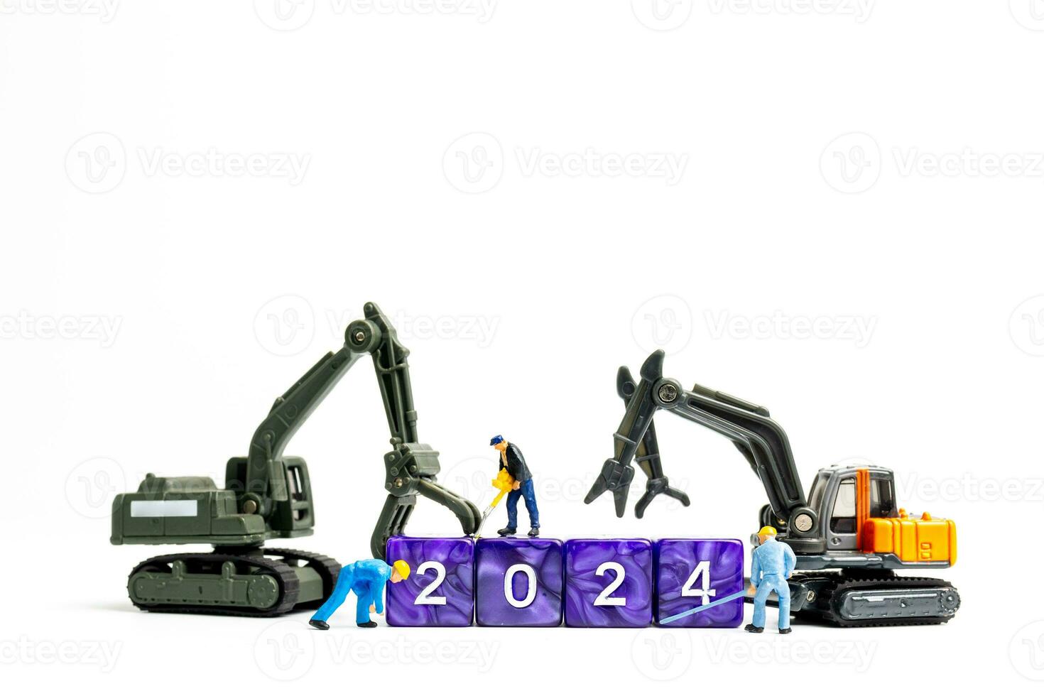 Miniature people , Worker team flips a block with the number 2024 photo