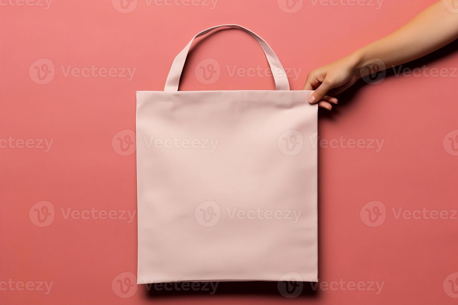 Empty mock-up of a cloth bag with a hand. photo
