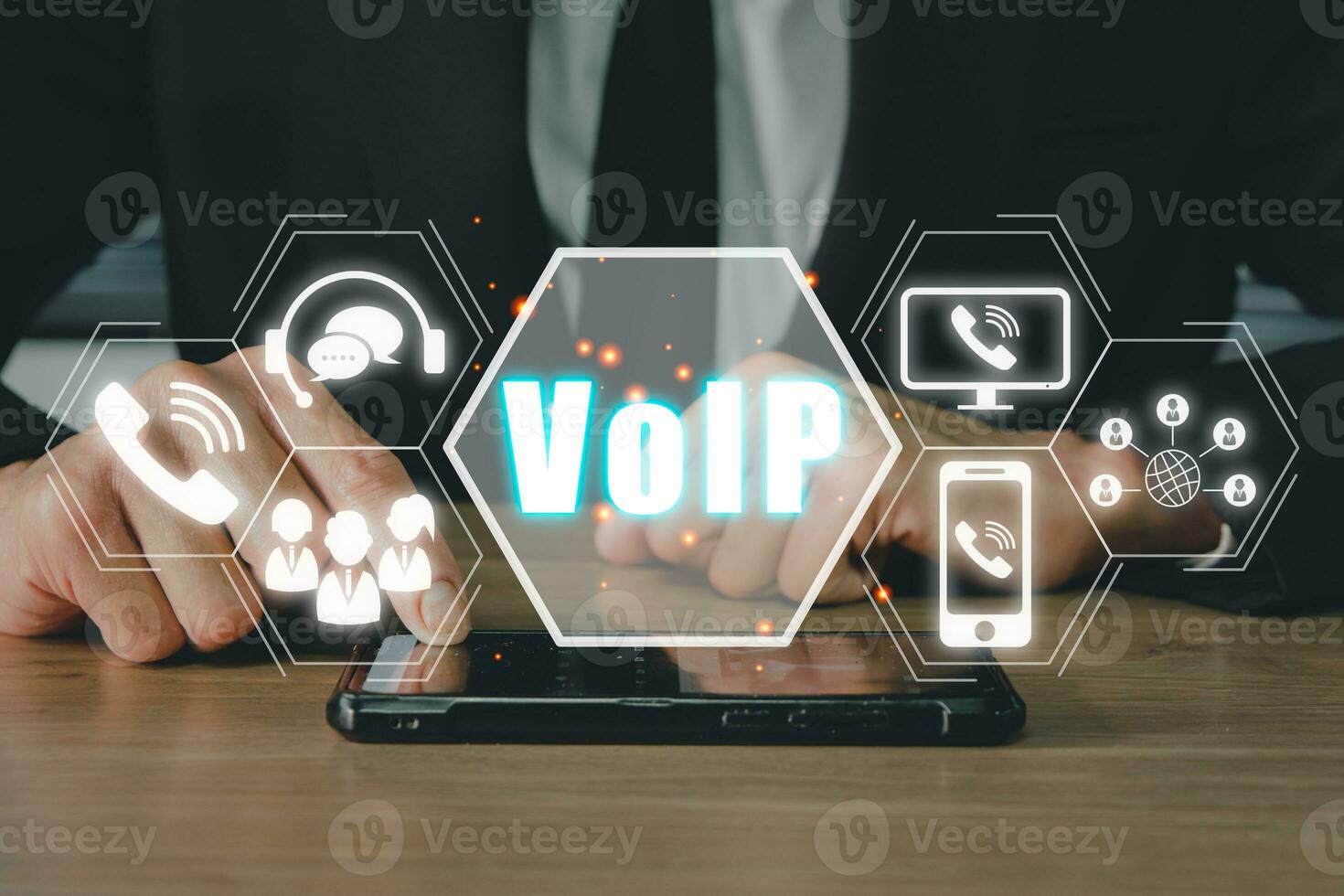 VoIP, Voice over IP Telecommunication concept, Business person hand using smartphone with VoIP icon on virtual screen. photo