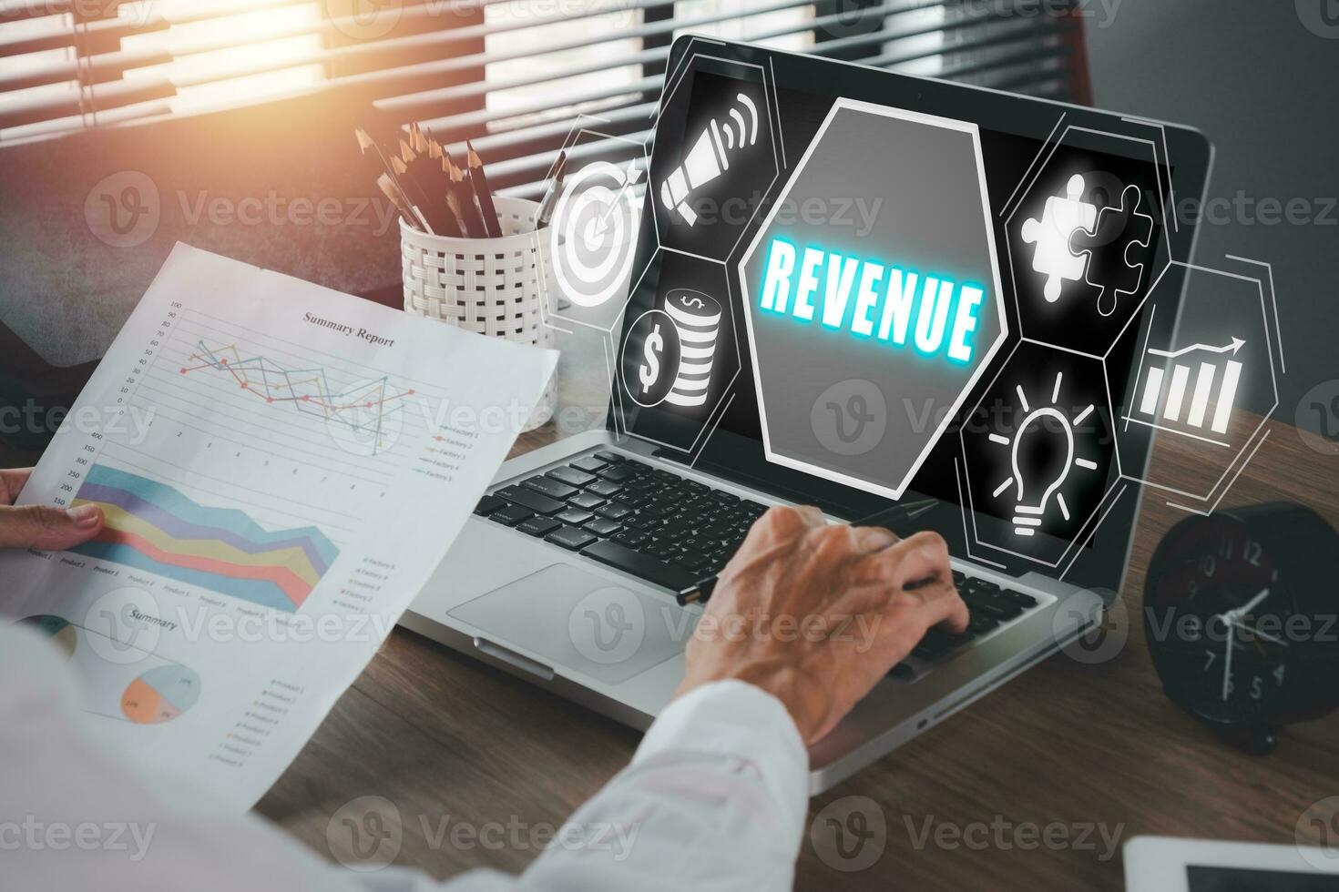 Revenue concept, Businessman analyzing income charts and graphs on laptop computer with revenue icon on virtual screen. photo