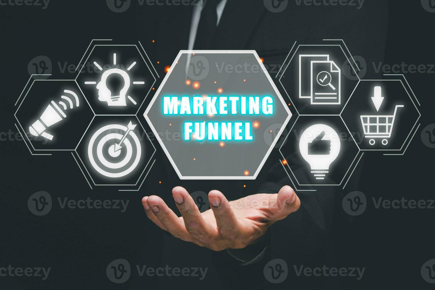 Marketing funnel concept, Business person hand holding marketing funnel icon on virtual screen. photo