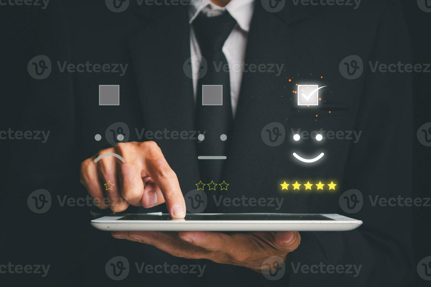 Feedback concept, Businessman using digital tablet with feedback icon on virtual screen. photo