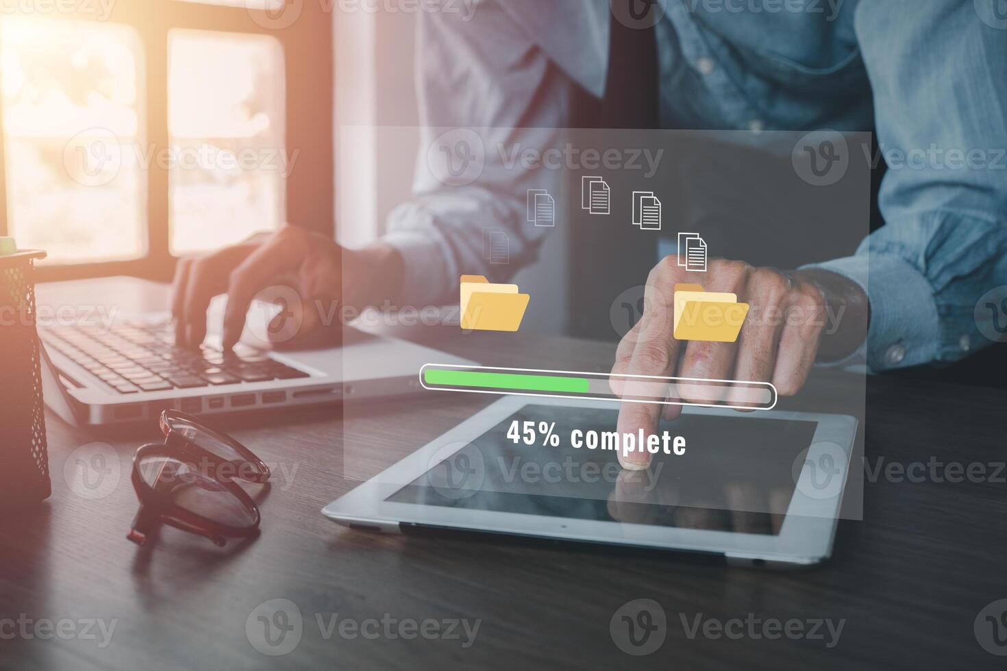 Transfer files data system relocation concept, Person hand using digital tablet waiting for transfer file process with loading bar icon on virtual screen. photo