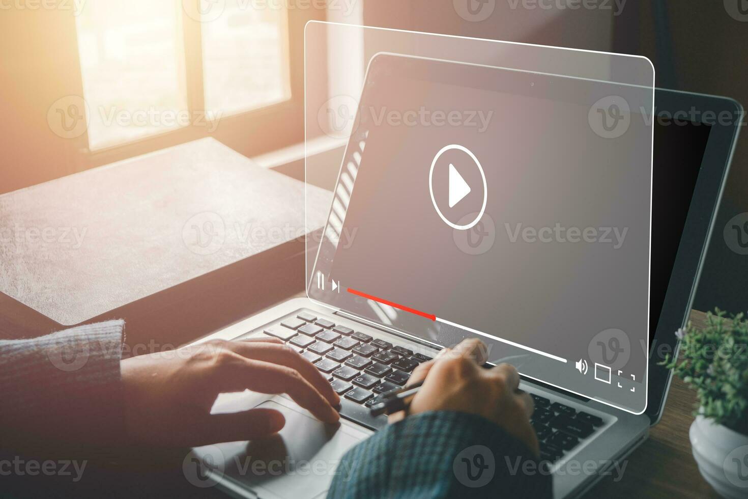 Video streaming on internet, Person watching online movie or TV series on laptop computer, Concept about subscription based live digital stream. photo