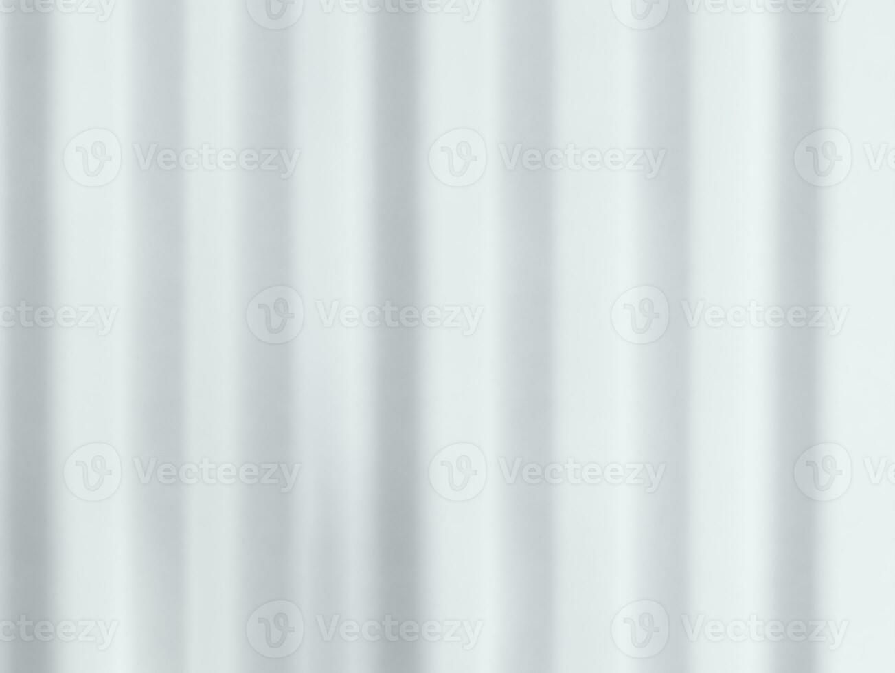 Blurry Light and shadows lines from curtain on the white wall. Sunny day with sun rays reflection from window. Element design for Mockup, Copy space for text photo
