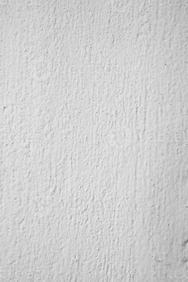 Old light white Concrete wall In black and white color, cement wall, broken wall, background texture,vertical photo