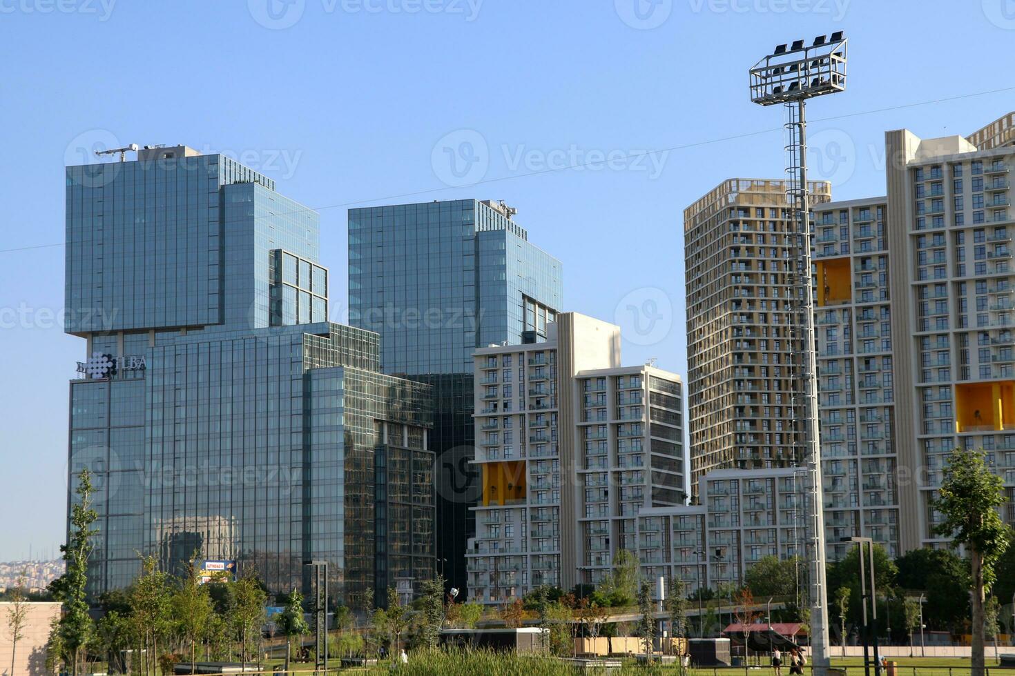 Condominium and apartment building with symmetrical modern architecture in the city downtown. photo