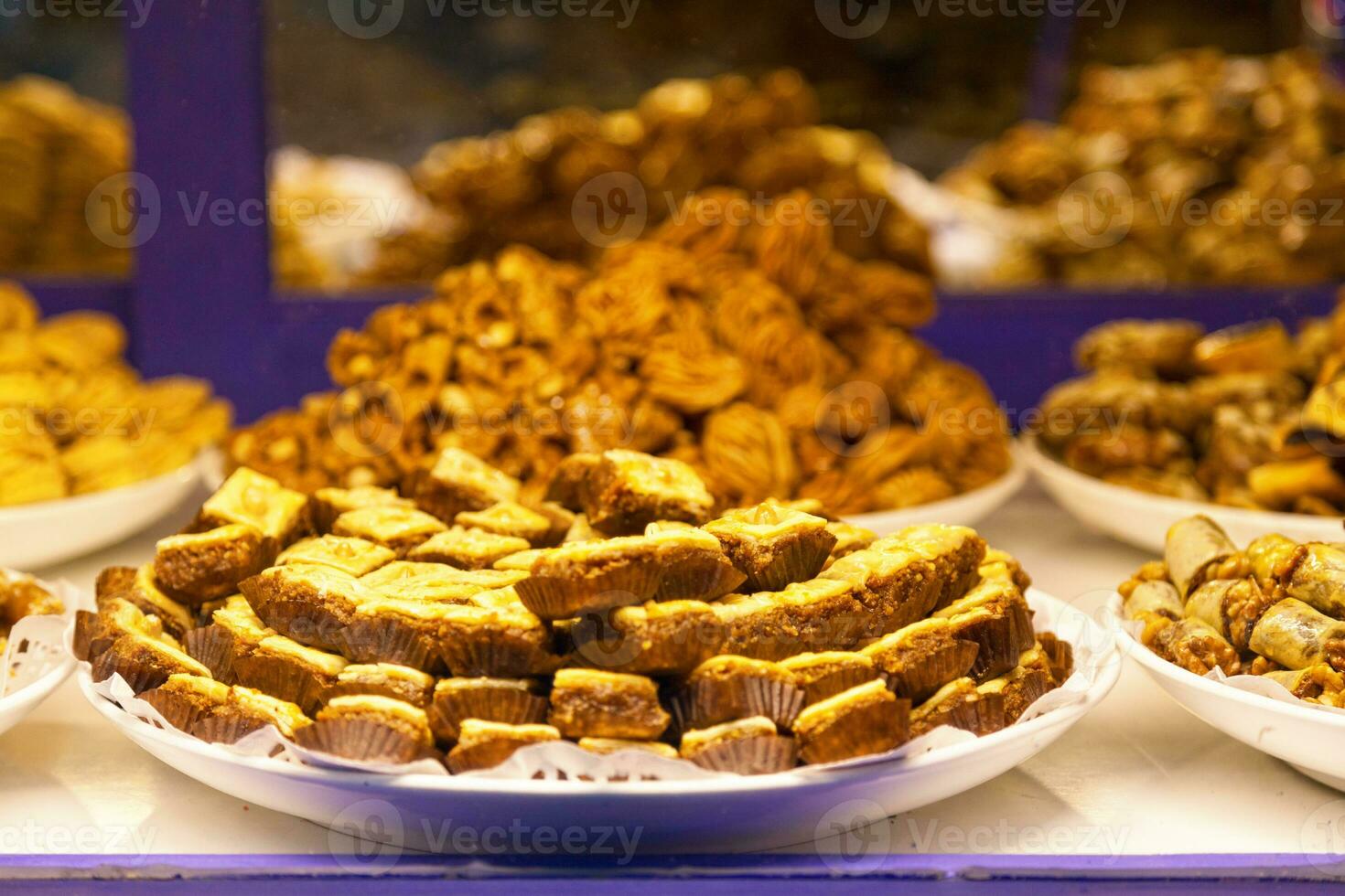Various Moroccan pastries in a bakery photo