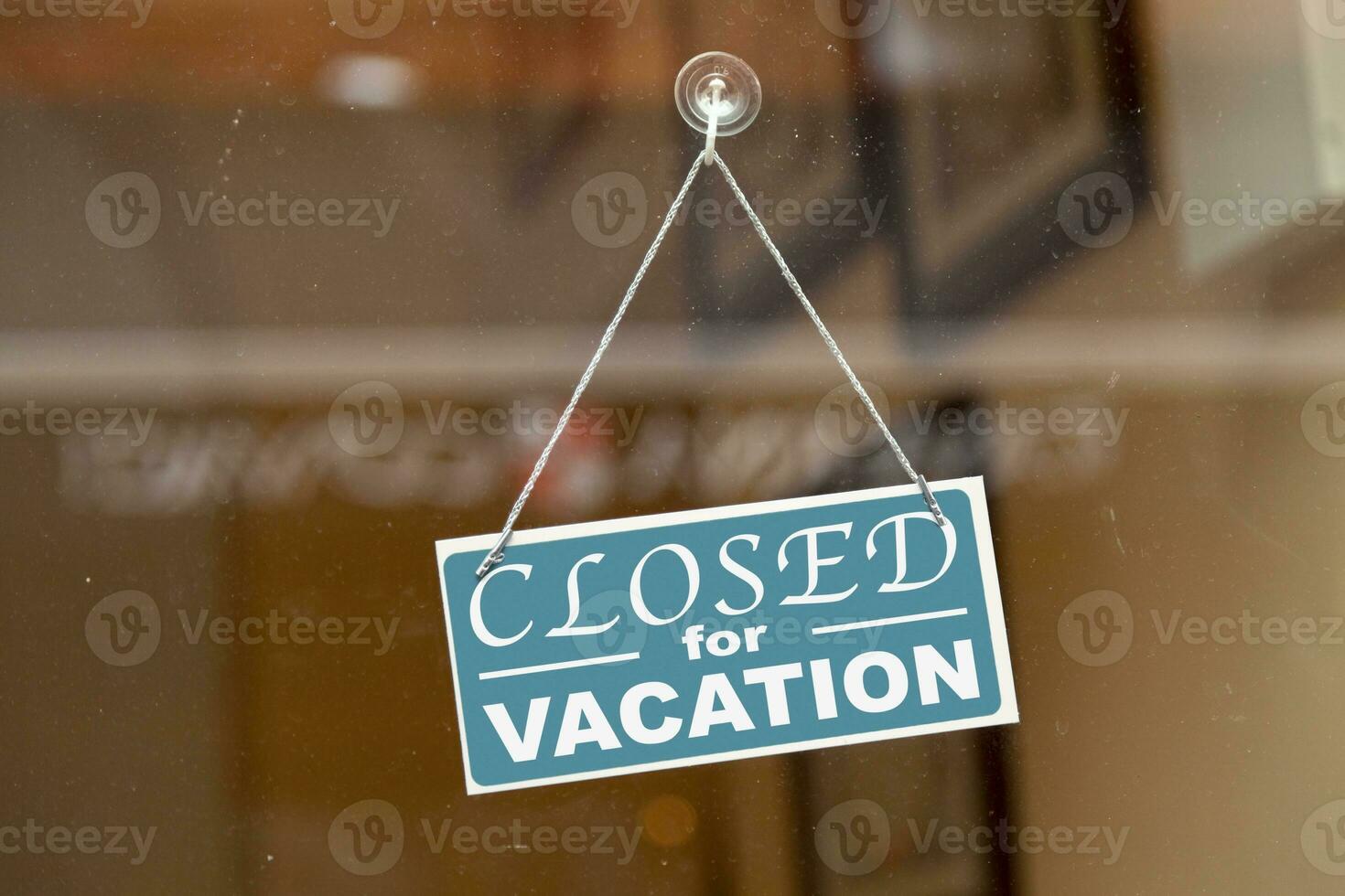 Closed for vacation sign photo