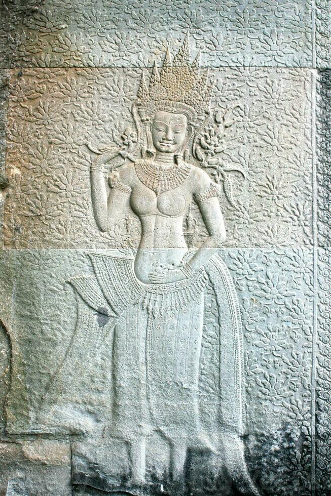 Bas relief of an Apsara dancer at Angkor Wat in Siem Reap photo