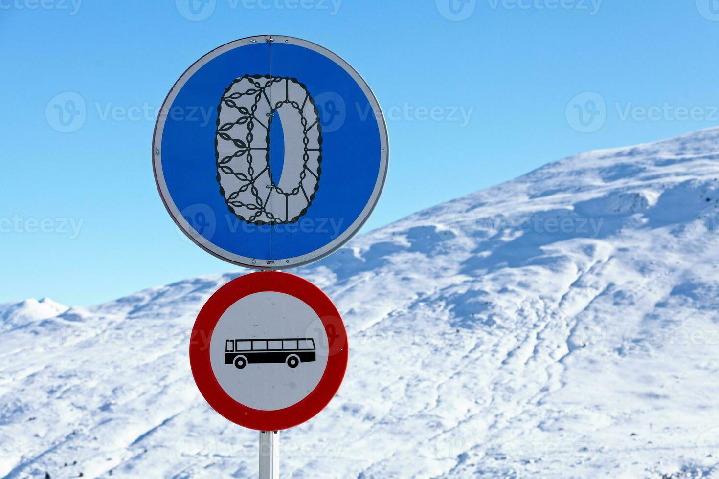 European snow chains and prohibition of buses sign photo