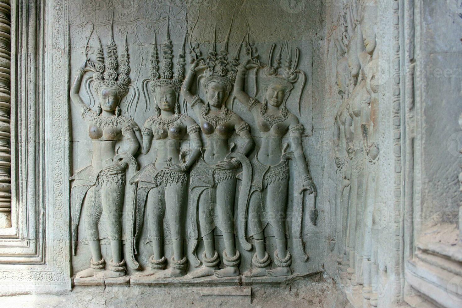 Bas relief of an Apsara dancers at Angkor Wat in Siem Reap photo