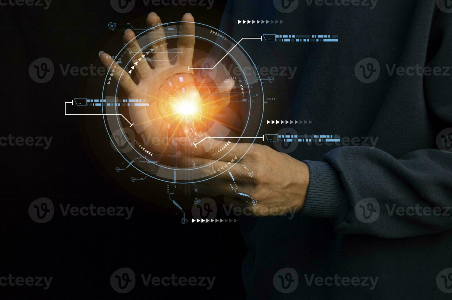 Close up of the hand of a person holding a bright light bulb in black background. Idea, innovation, idea and inspiration for business concept. cyber digital data concept photo