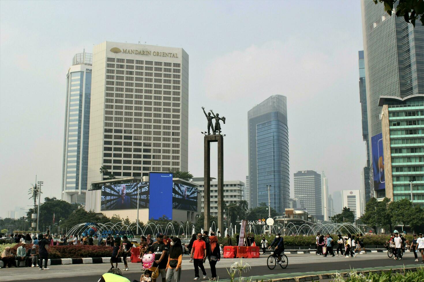 Jakarta, Indonesia-18 June 2023 bundaran hi view in the afternoon photo