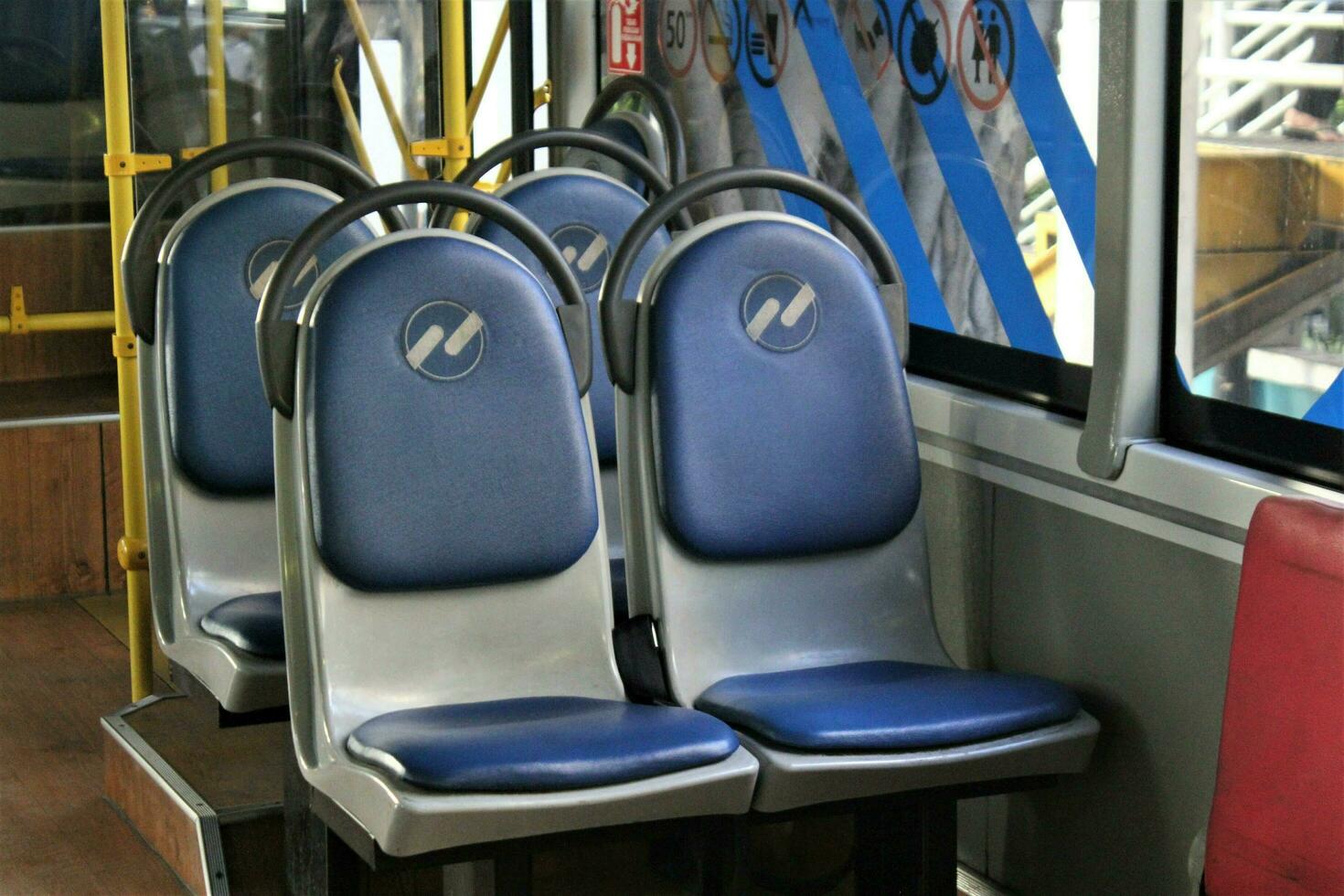 Jakarta, Indonesia-18 June 2023 Transjakarta bus seats with the theme of Transjakarta bus interiors photo