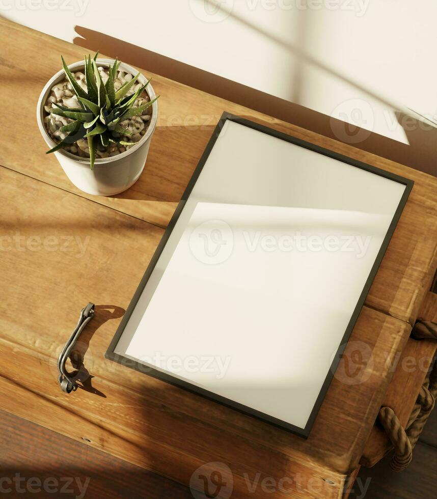 minimal aesthetic frame mockup poster laying on the table with decoration plant and light by sunlight photo