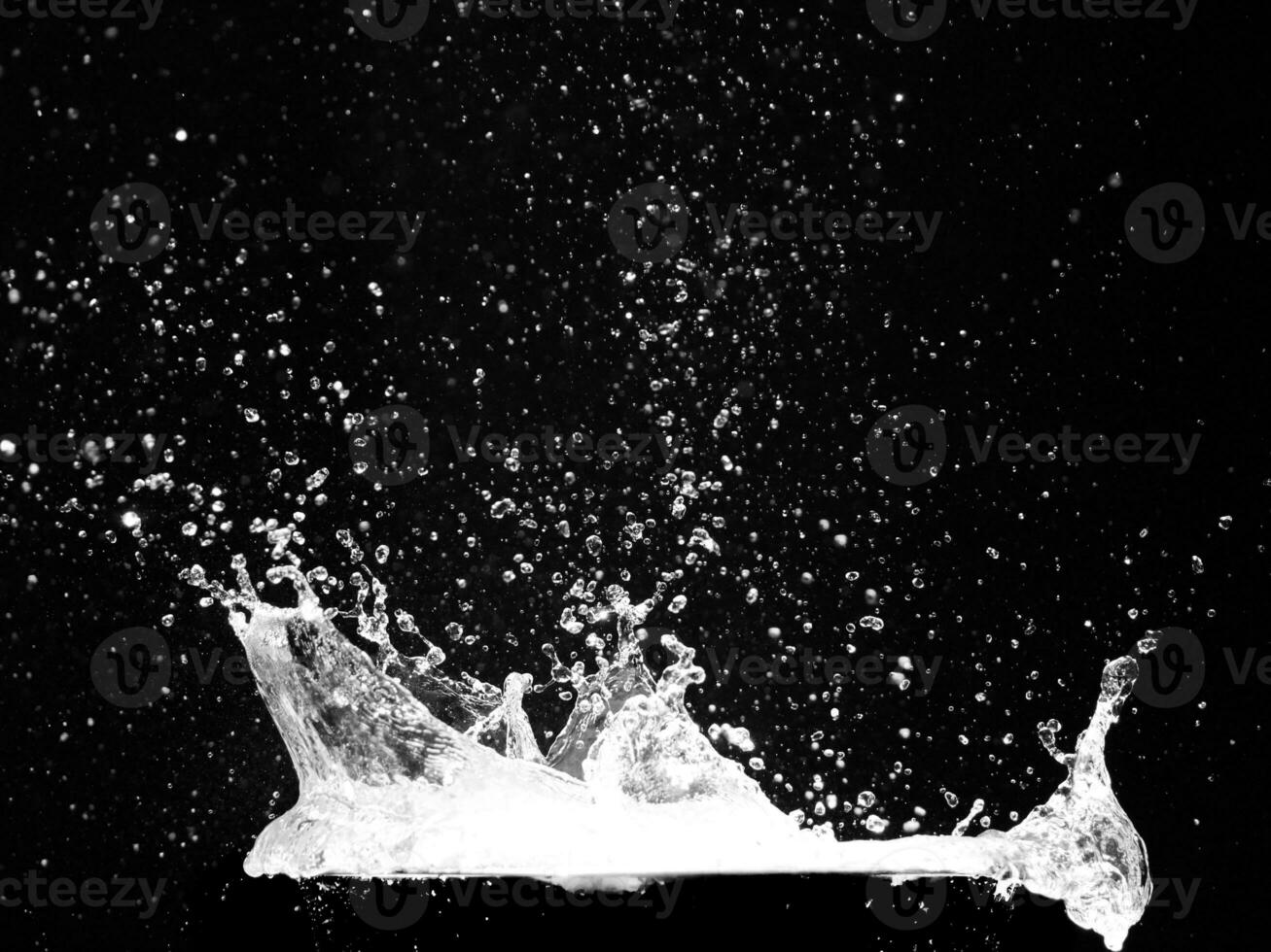 water splash on black background photo