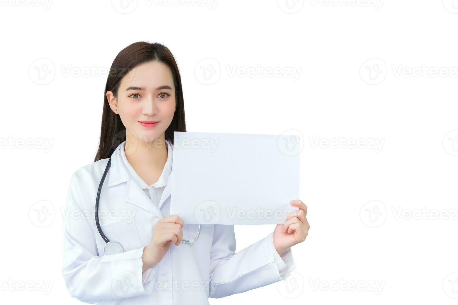 Professional young Asian woman doctor who wears medical coat holds and shows white paper to present something in healthcare concept isolated on white background. photo