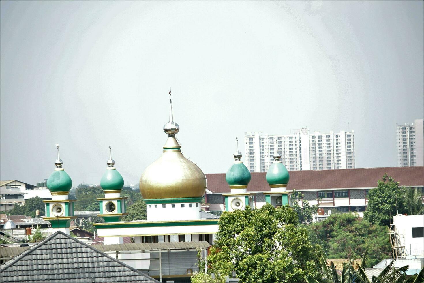 Jakarta, Indonesia-18 June 2023 the dome of the mosque with a beautiful pattern against the clear sky photo