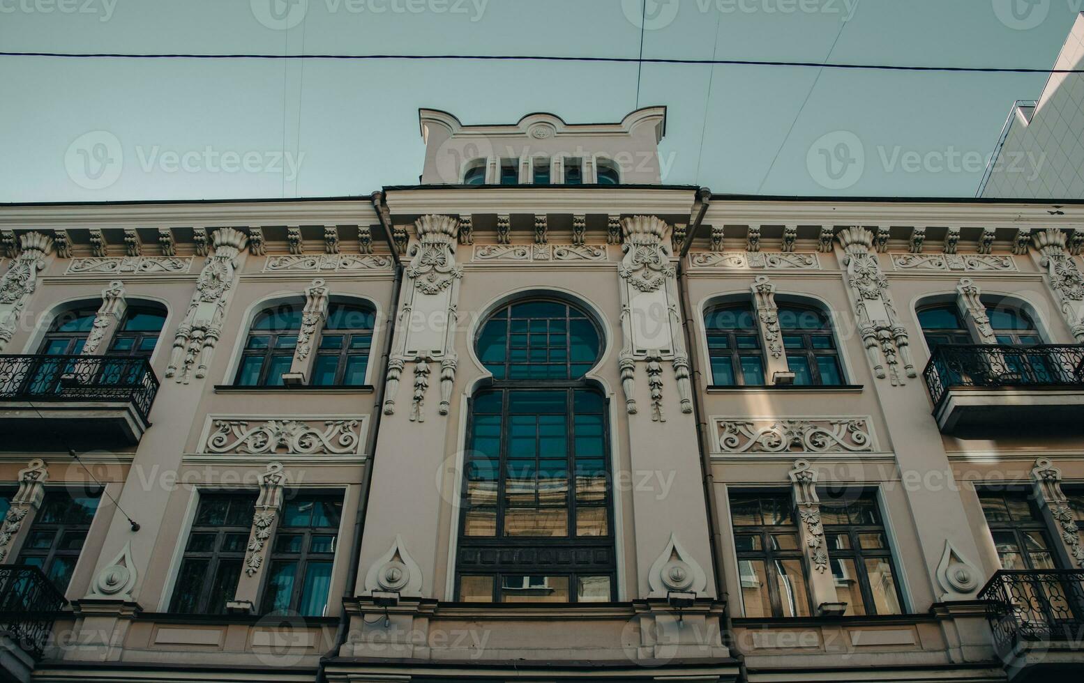Morning Kharkiv city center building with panoramic windows photo. photo