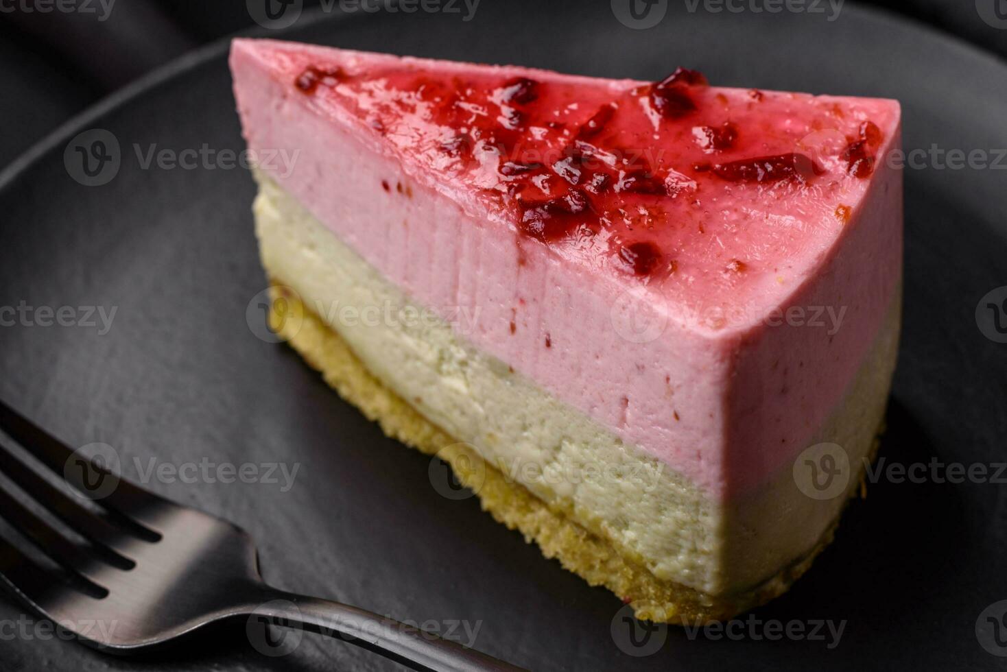 Delicious sweet dessert cheesecake with raspberry and pistachio flavor photo