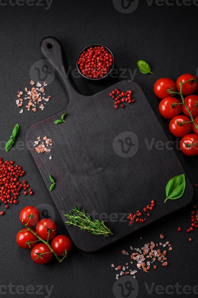 Ingredients for cooking cherry tomatoes, salt, spices and herbs photo