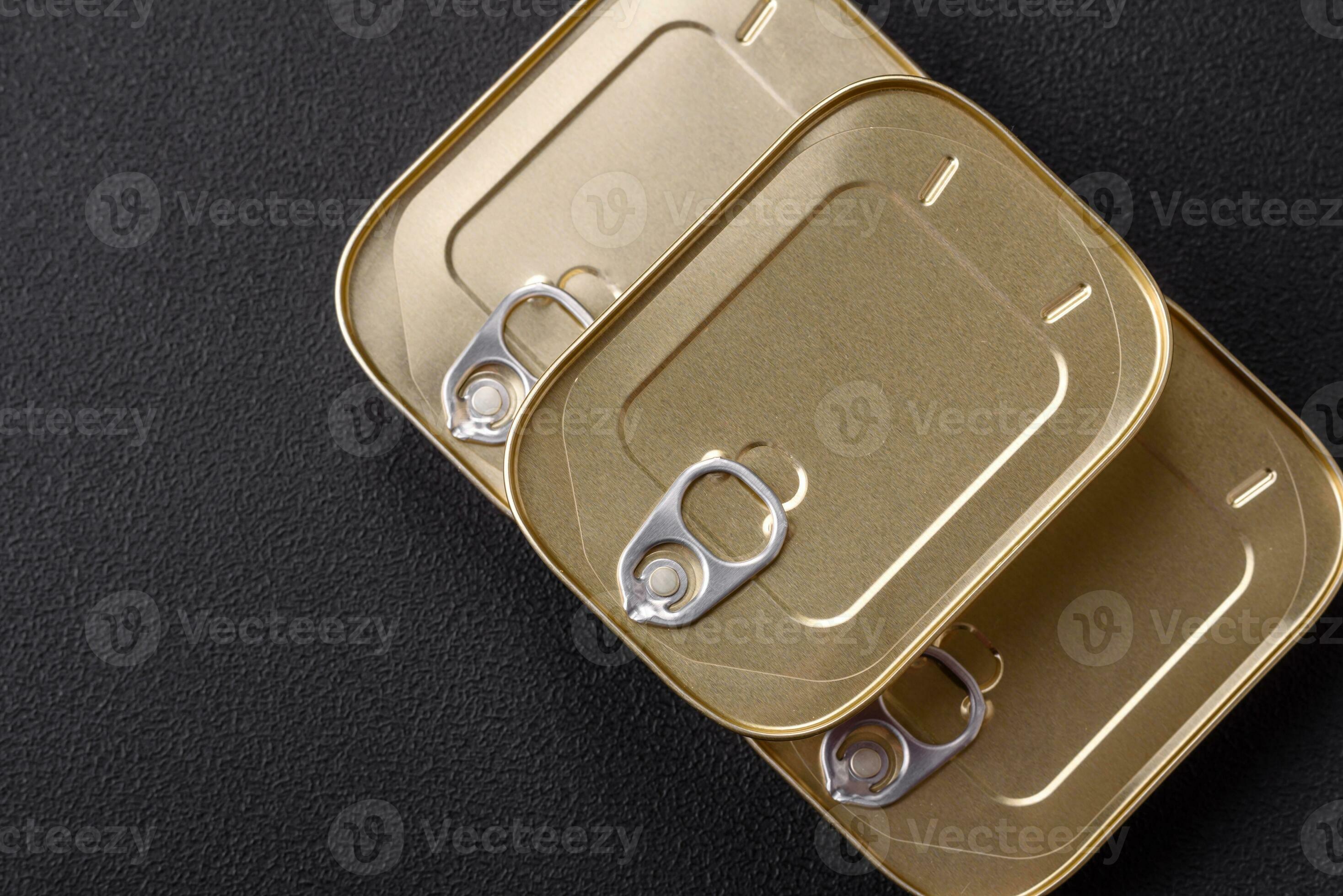 Tin or aluminum rectangular can of canned food with a key 26353499