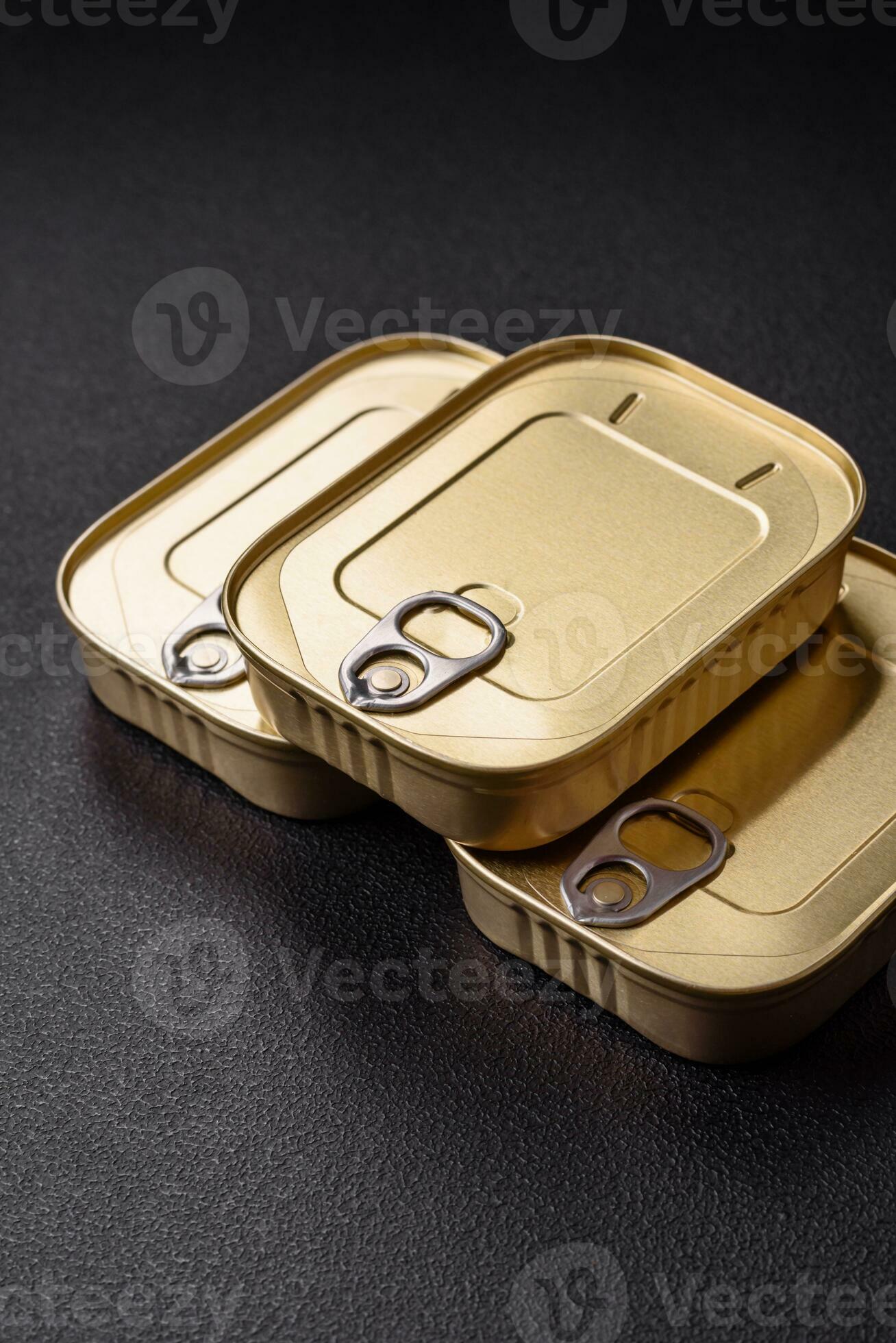 Tin or aluminum rectangular can of canned food with a key 26353522