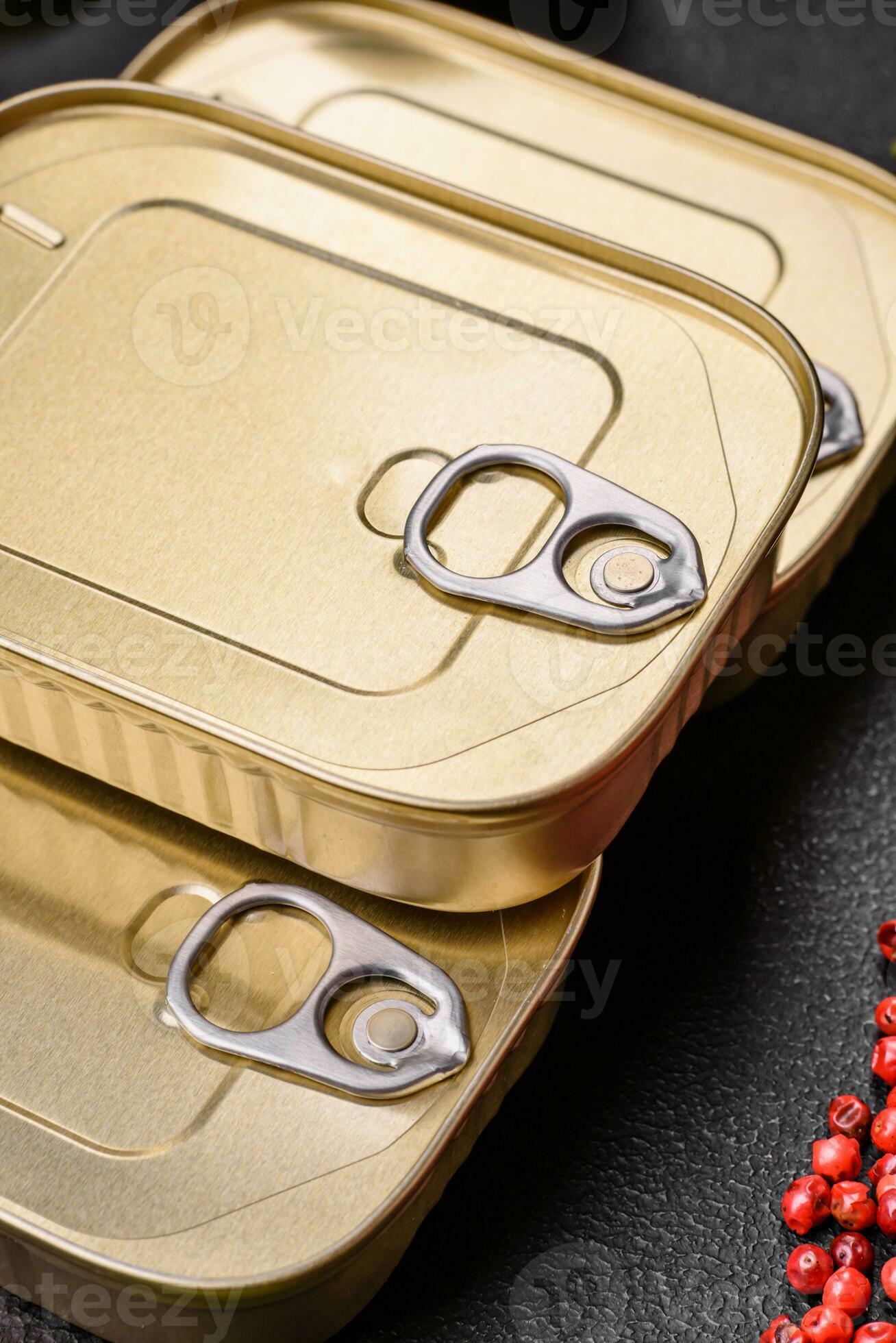 Tin or aluminum rectangular can of canned food with a key 26353525