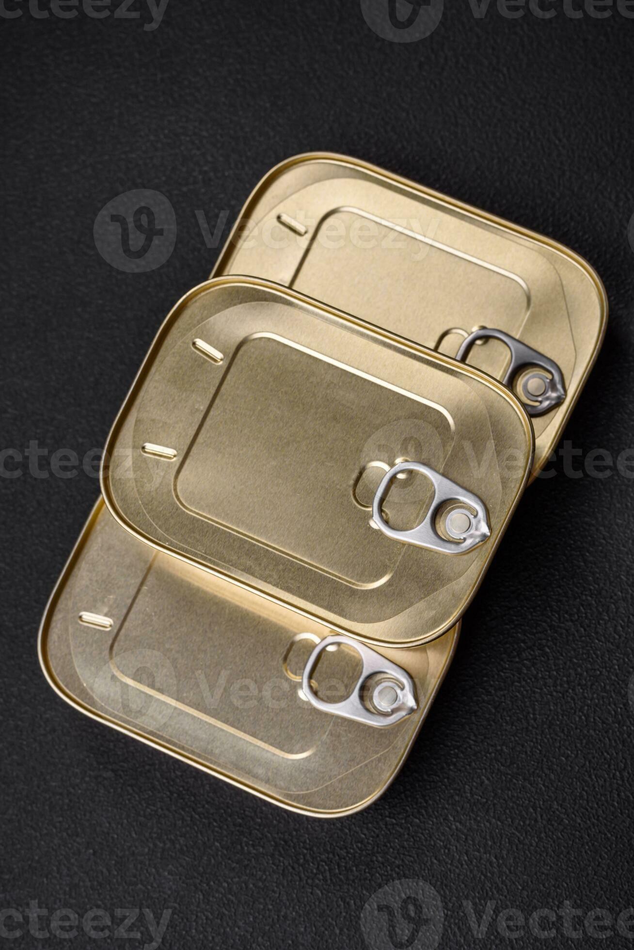 Tin or aluminum rectangular can of canned food with a key 26353561