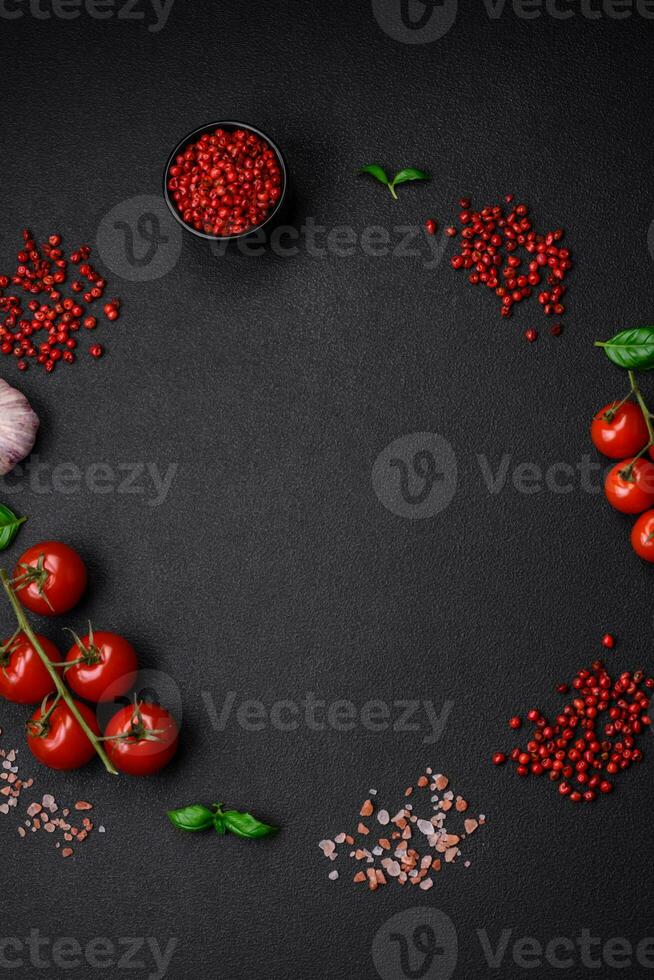 Ingredients for cooking cherry tomatoes, salt, spices and herbs photo