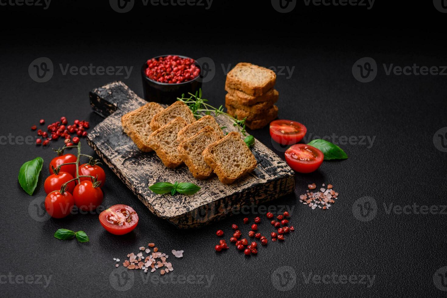 Delicious salted rectangular wheat croutons with salt and spices photo