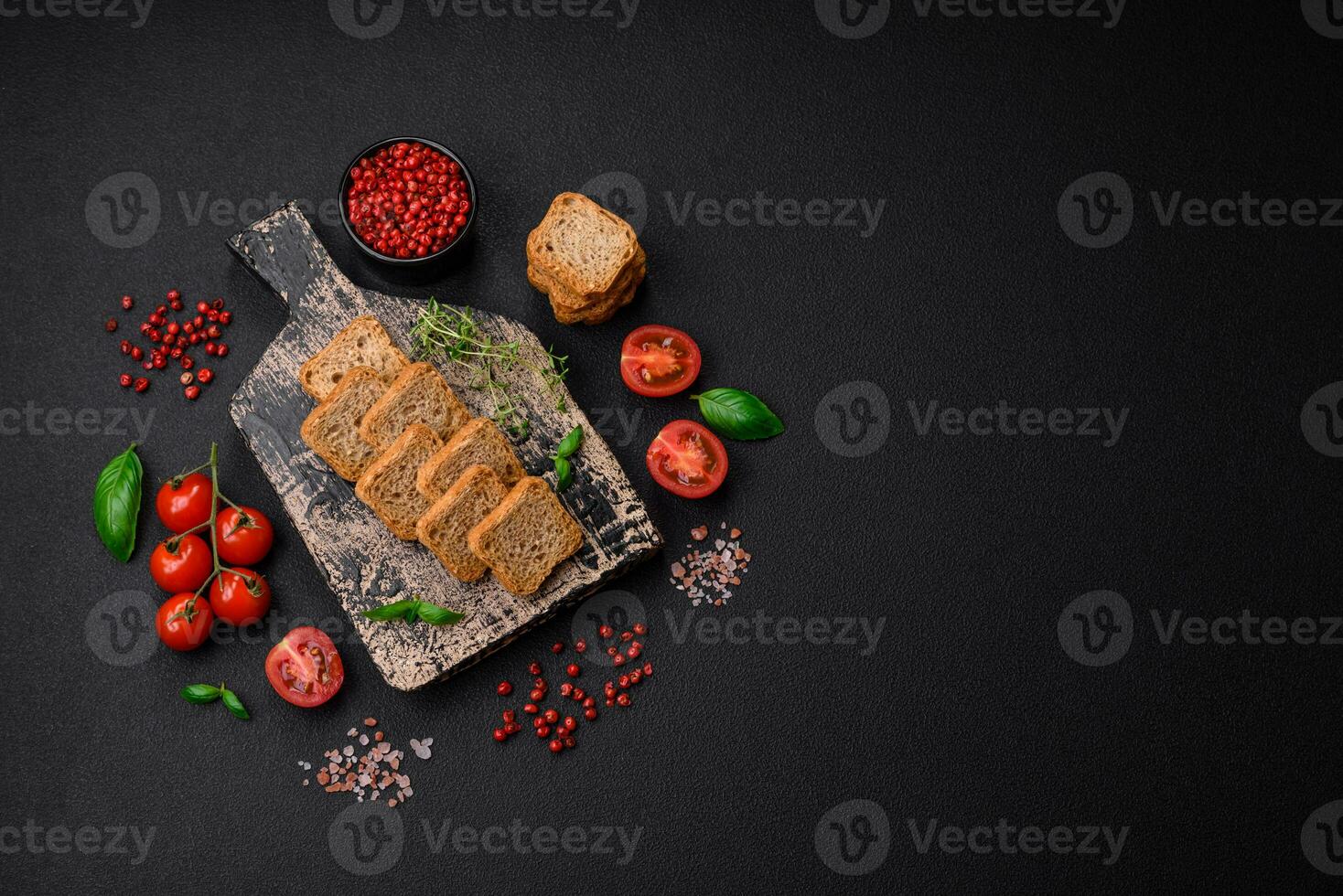 Delicious salted rectangular wheat croutons with salt and spices photo