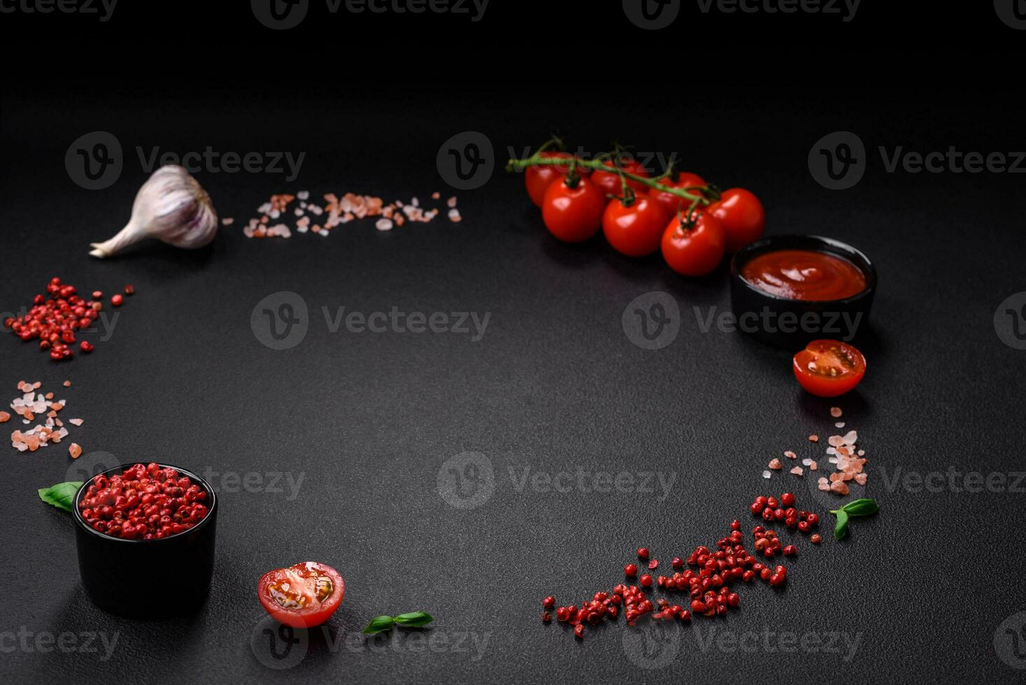 Ingredients for cooking cherry tomatoes, salt, spices and herbs photo