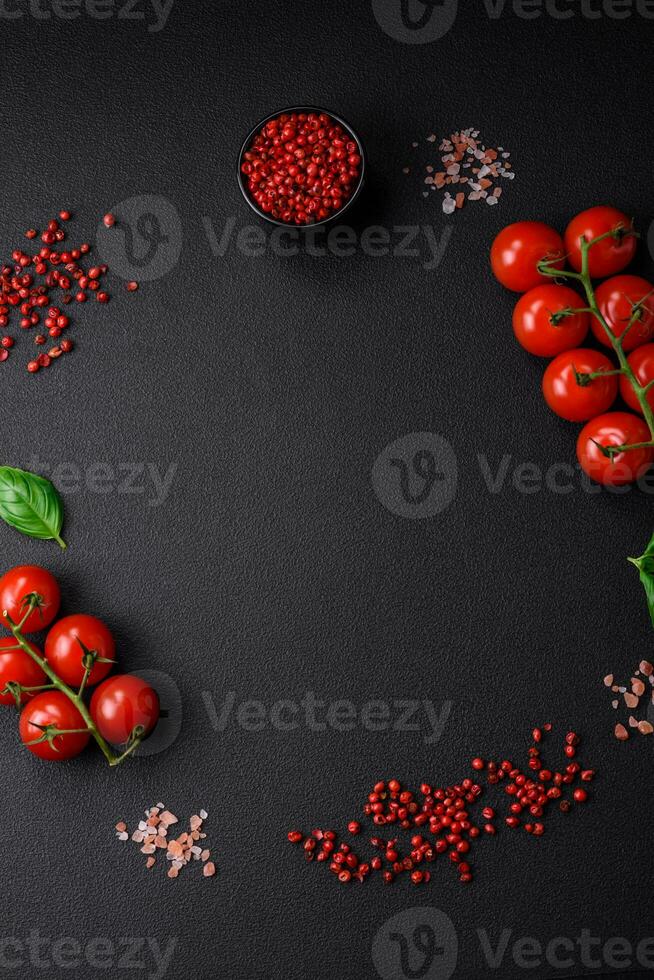 Ingredients for cooking cherry tomatoes, salt, spices and herbs photo