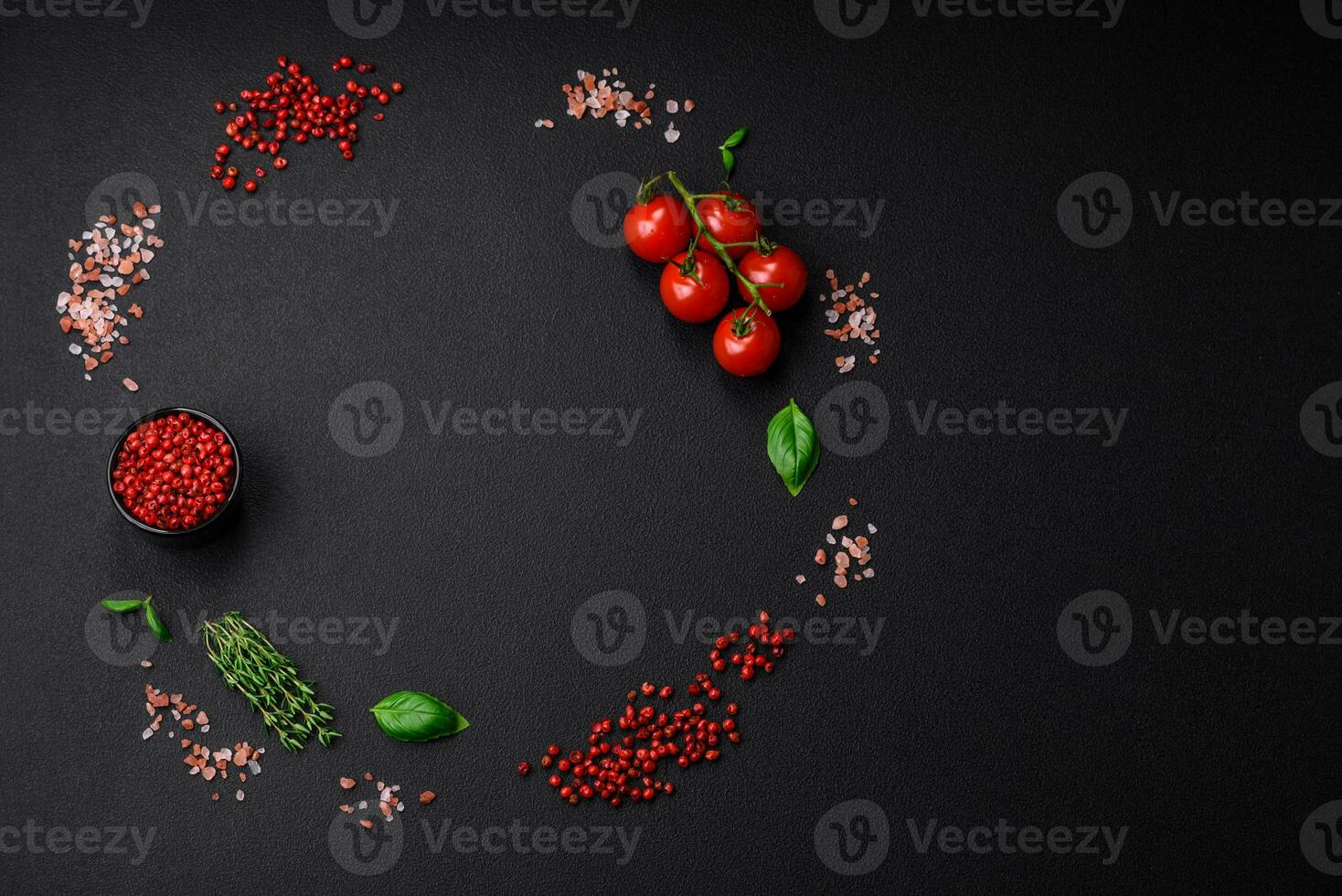 Ingredients for cooking cherry tomatoes, salt, spices and herbs photo