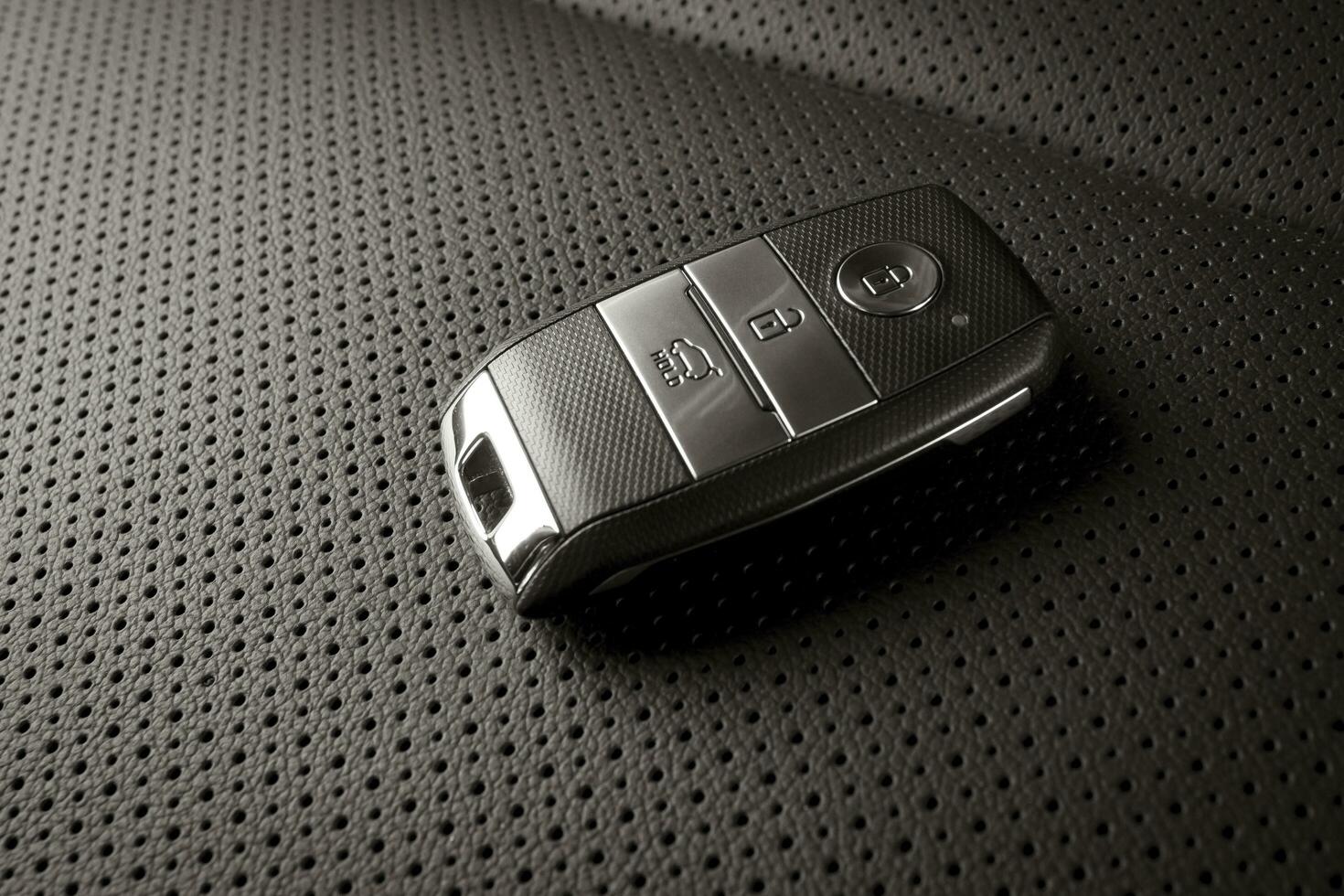 New car key, with modern and luxurious details inside the vehicle photo