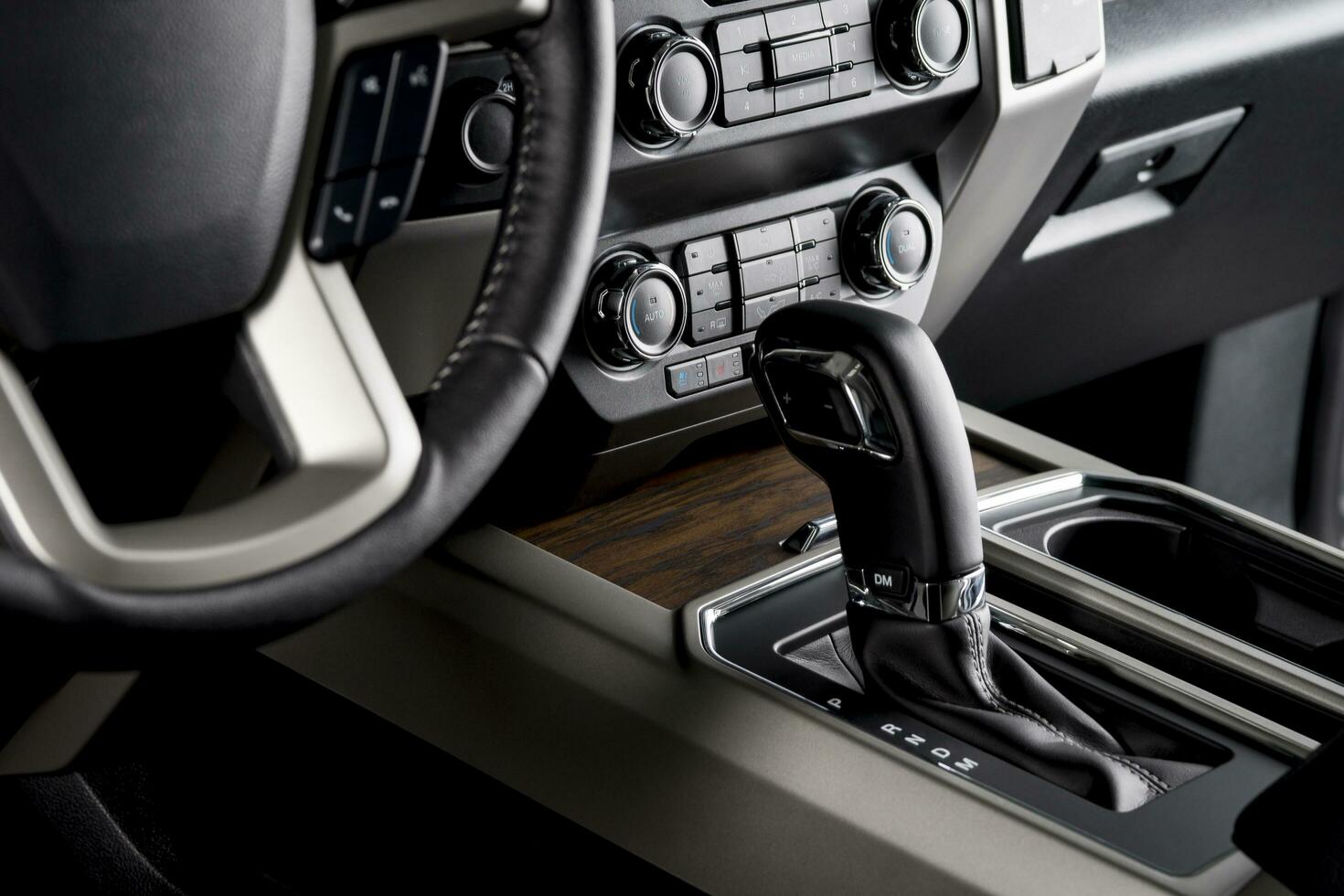 Pickup truck with the most luxurious interiors, automatic gear lever close up, designed for comfortable driving photo