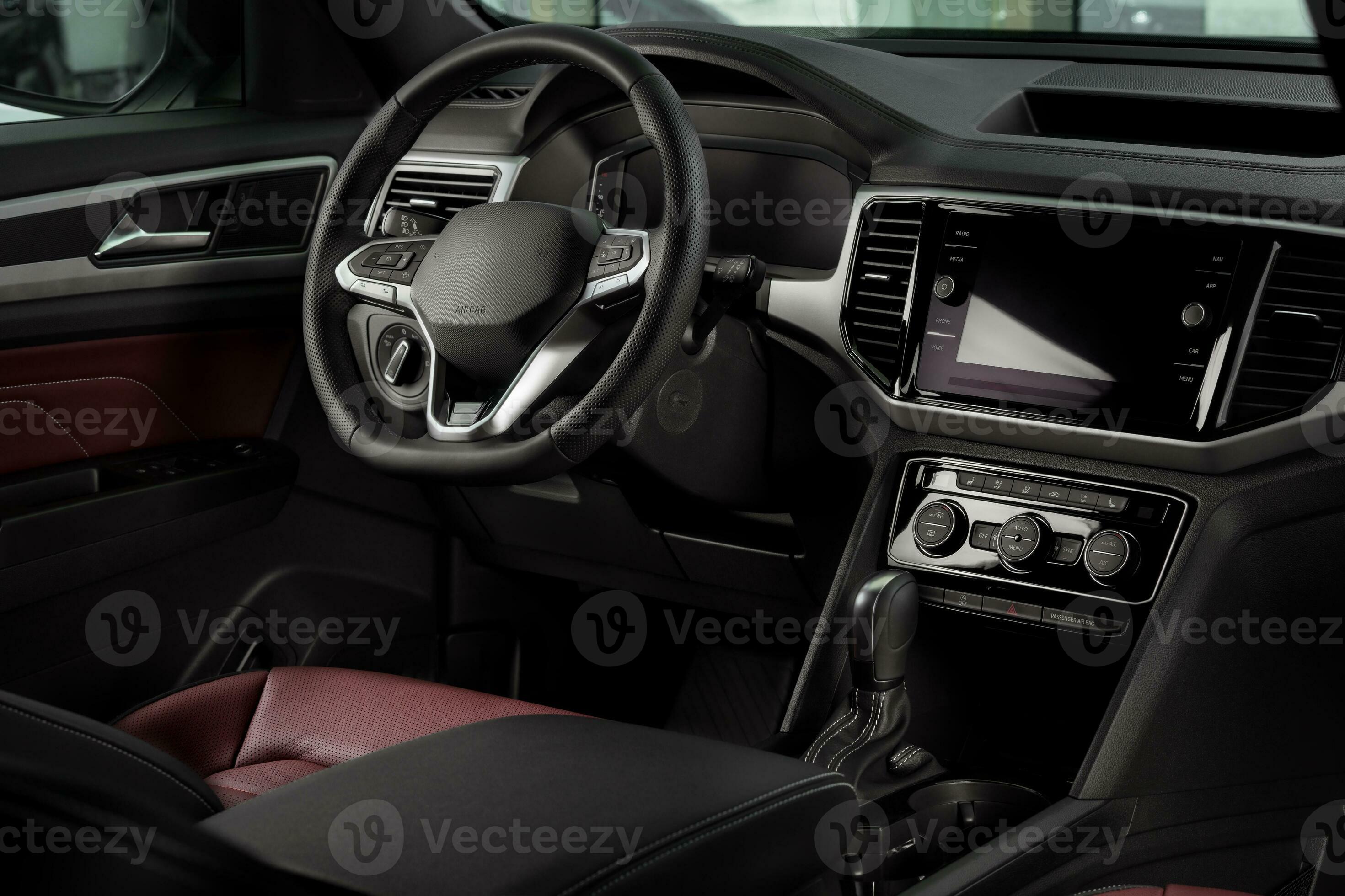 New automobile interior details with leather steering wheel, automatic
