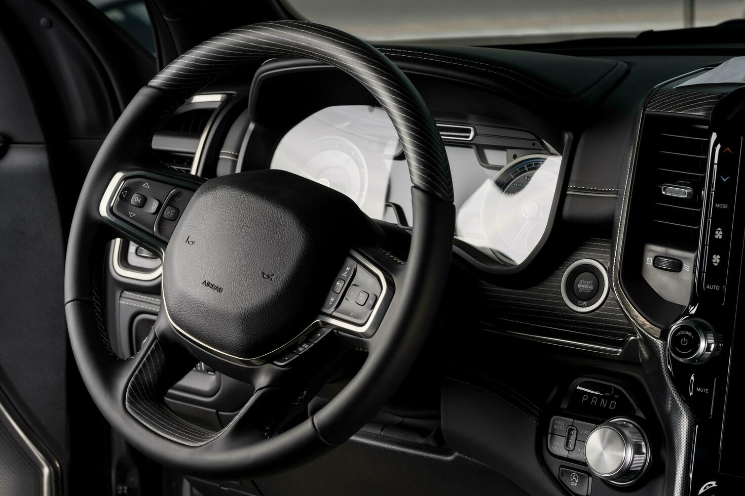 New car interior steering wheel, electric dashboard display close up - airbag photo