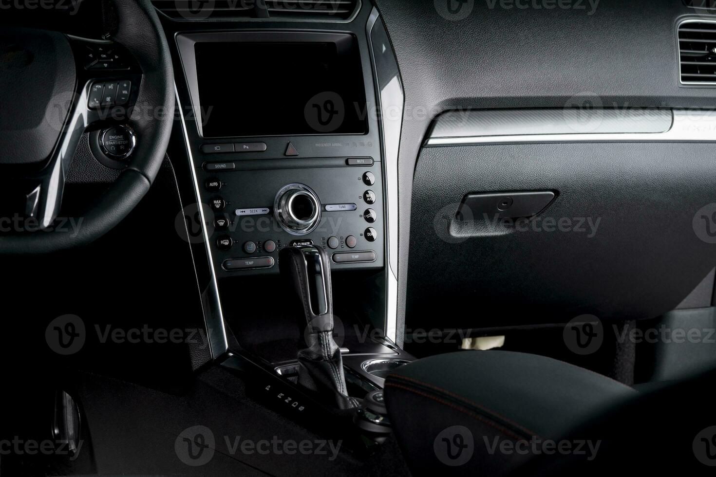 Digital car dashboard - steering wheel, automatic transmission and touch screen inside cockpit photo