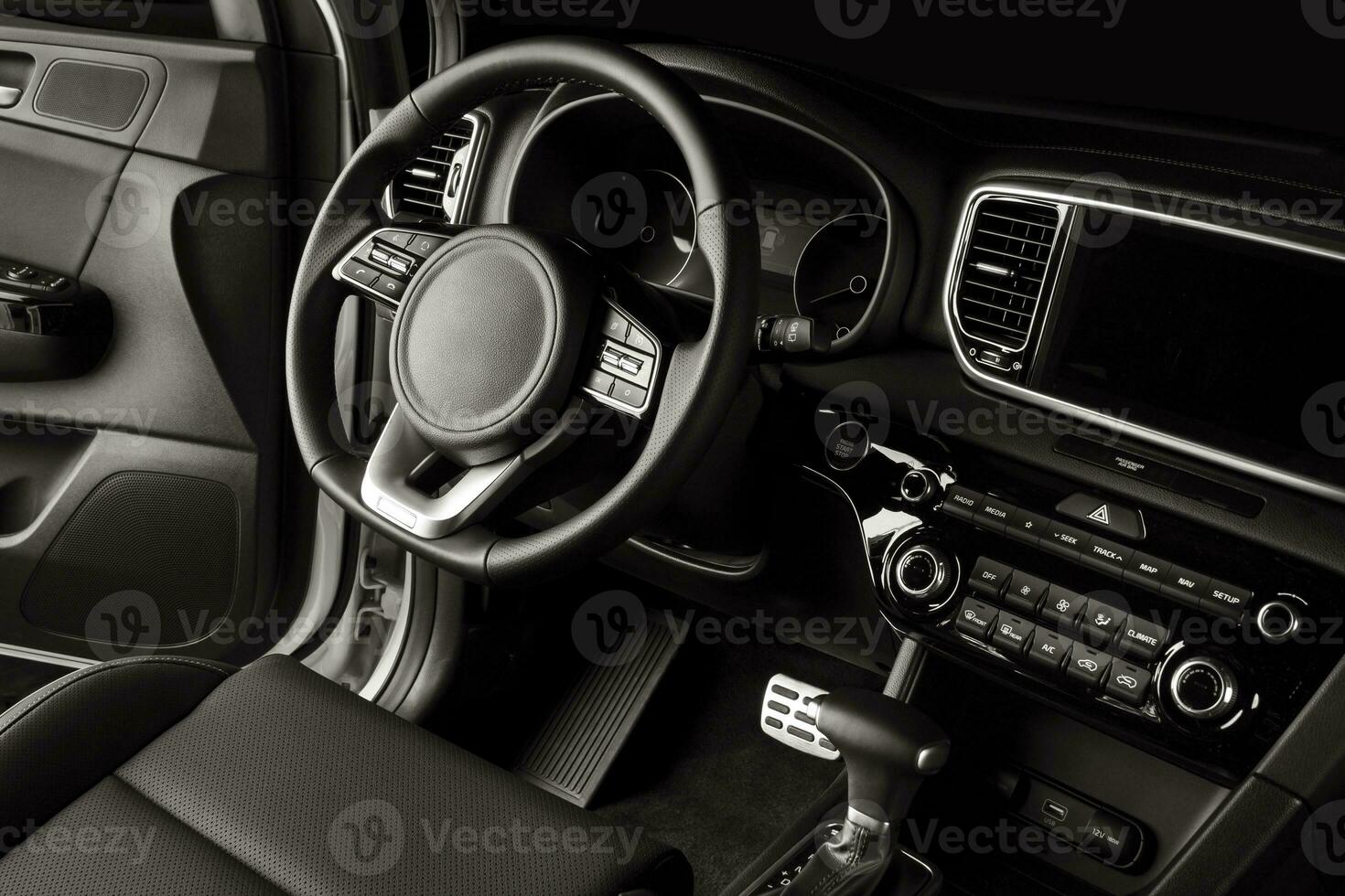 New car steering wheel, luxurious details in black leather photo