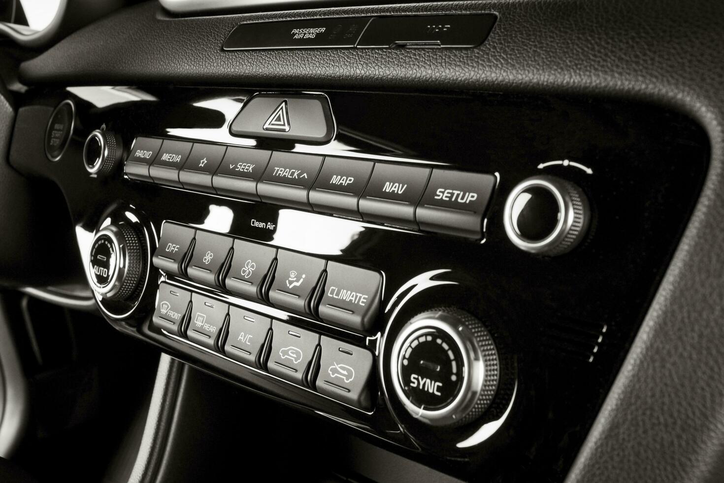 Radio and air conditioning system inside a new car photo