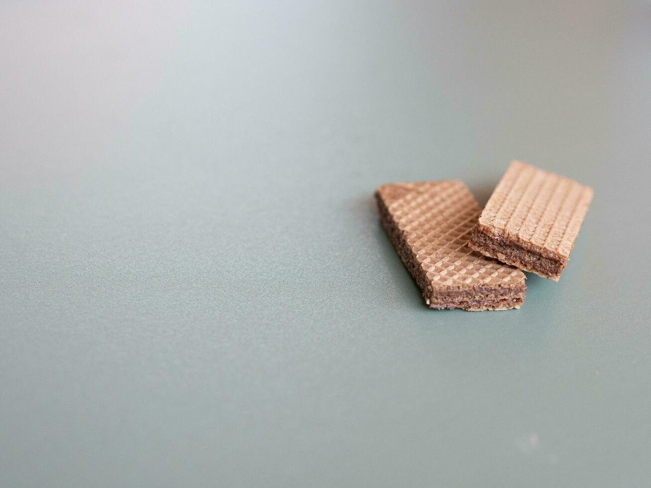 chocolate wafer on gray background with copy space photo