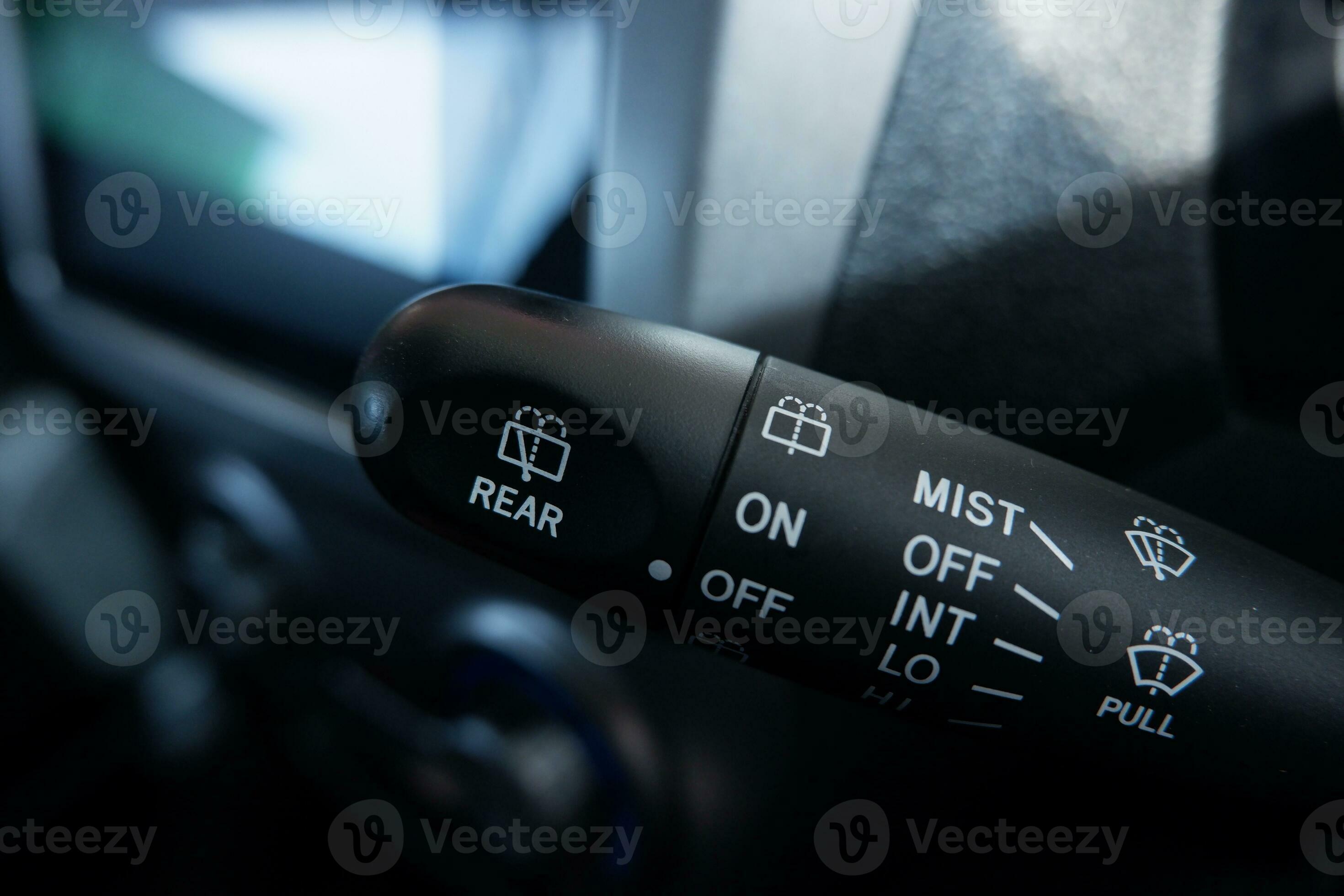 selective focus handle to control the windshield wiper in car. Modern car interior detail