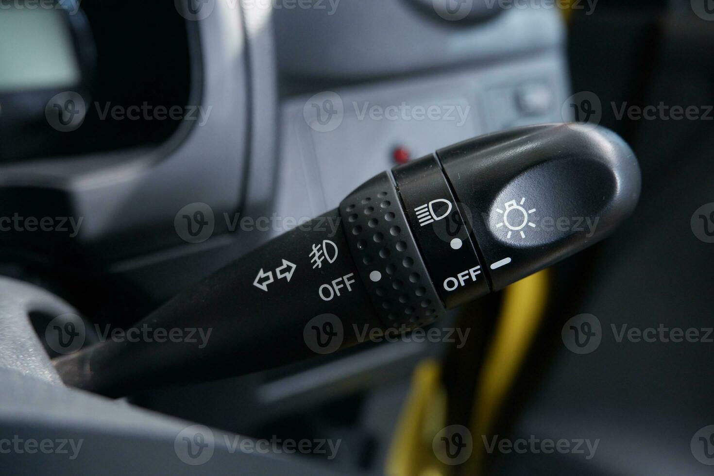 selectively focus on the handle of the car light switch control photo