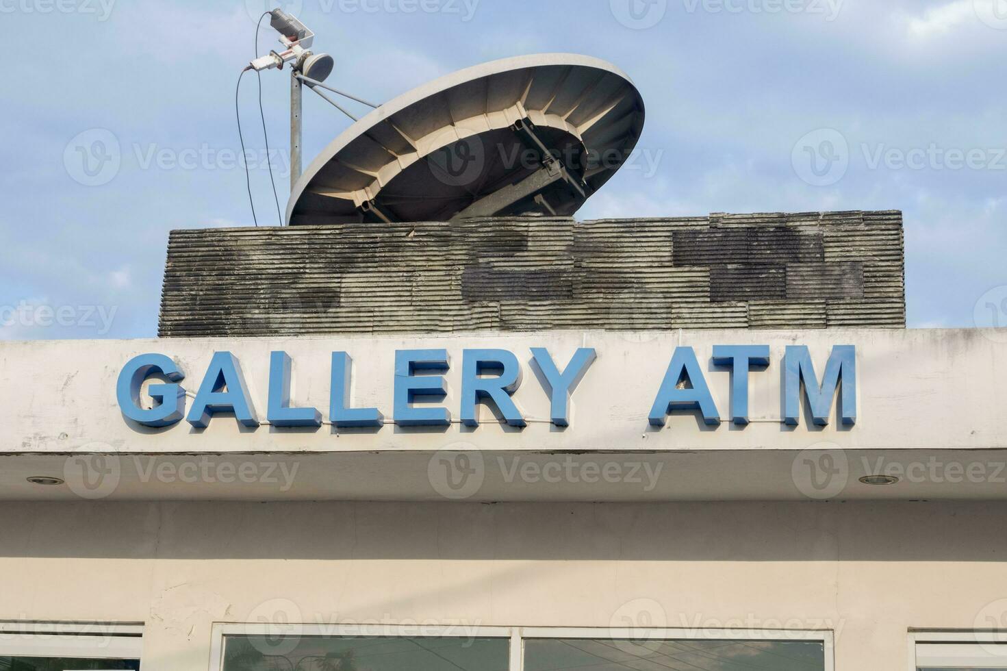 atm gallery writing, a special building for ATM machines to withdraw money from various types of banks photo