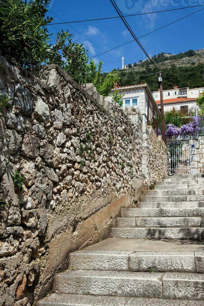 The beautiful steepy alleys of Dubrovnik city photo